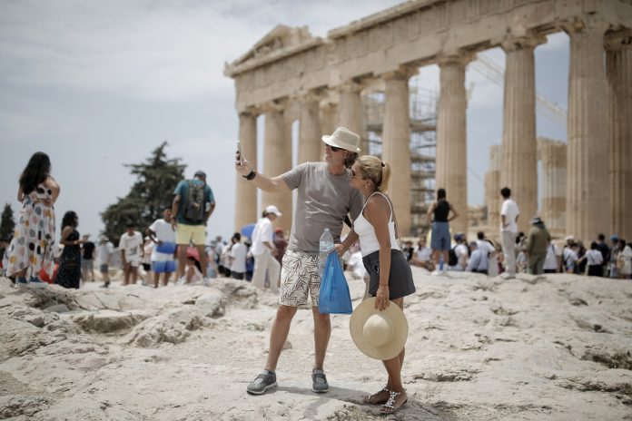 Tourists visit the Acropolis amid heatwave in Greece